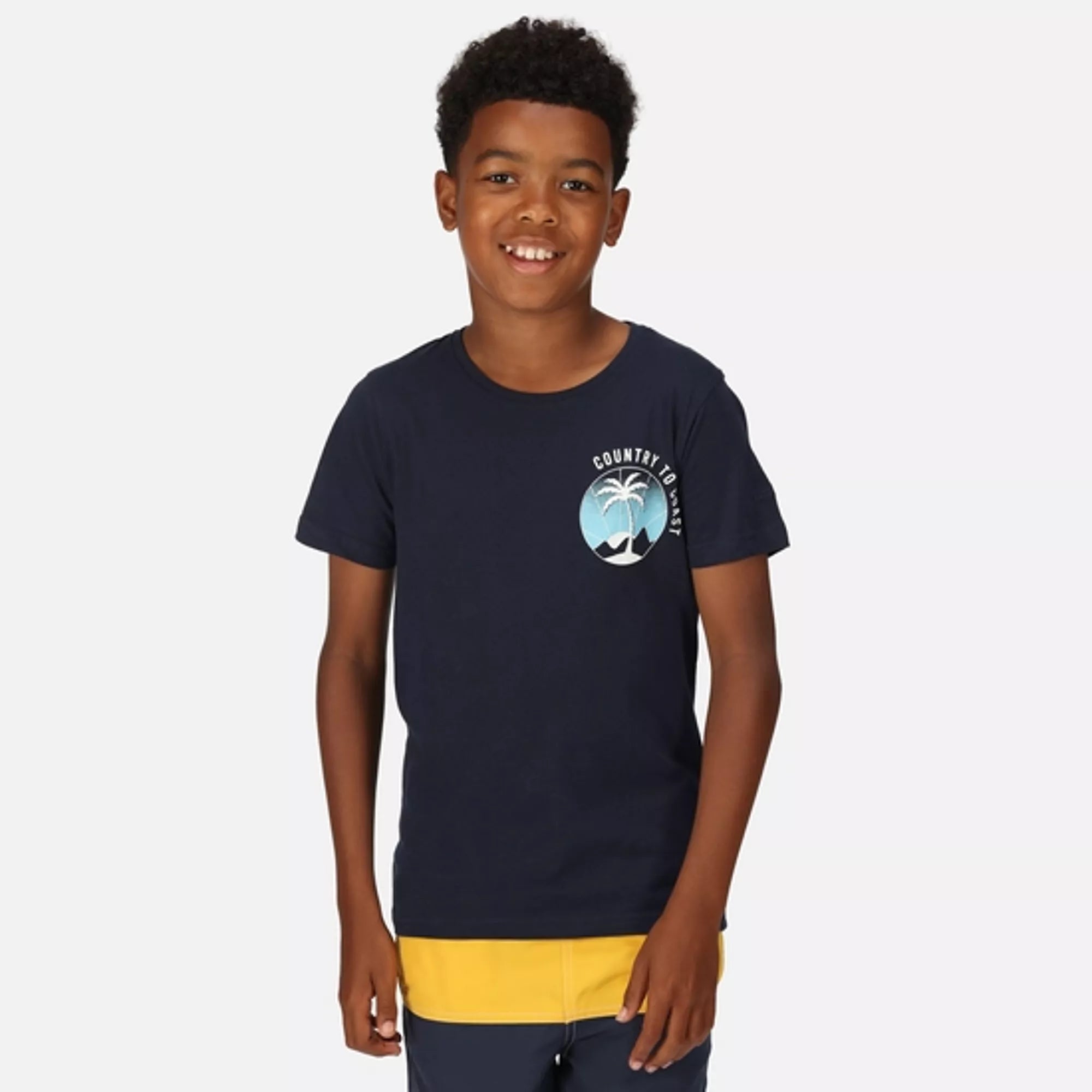 Foto de Smiling Teen in Capri Leggings and T-Shirt do Stock